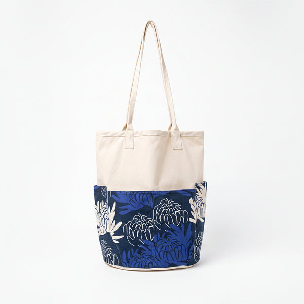 Chrysanthemum Pattern Canvas Tool Tote Bag by GOC Studio, natural Japanese cotton canvas body with navy and blue chrysanthemum print and long shoulder straps