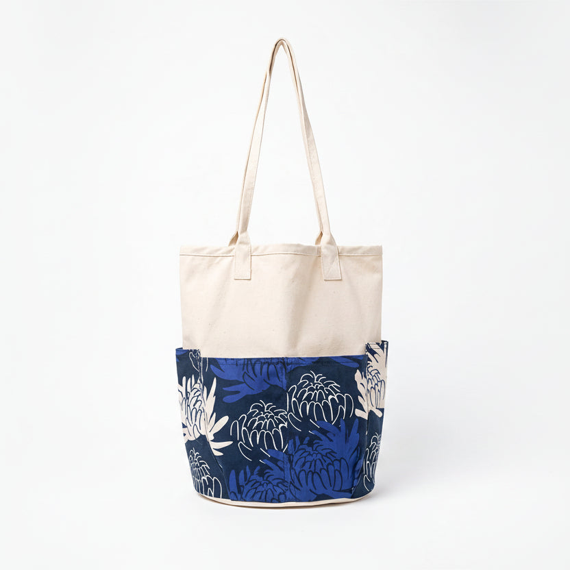 Chrysanthemum Pattern Canvas Tool Tote Bag by GOC Studio, natural Japanese cotton canvas body with navy and blue chrysanthemum print and long shoulder straps