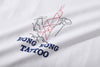 ih white cotton t shirt close up of the high quality tattoo inspired ufo embroidery and heat transferred wording