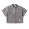 Checkered shirt with a brand label on a white background