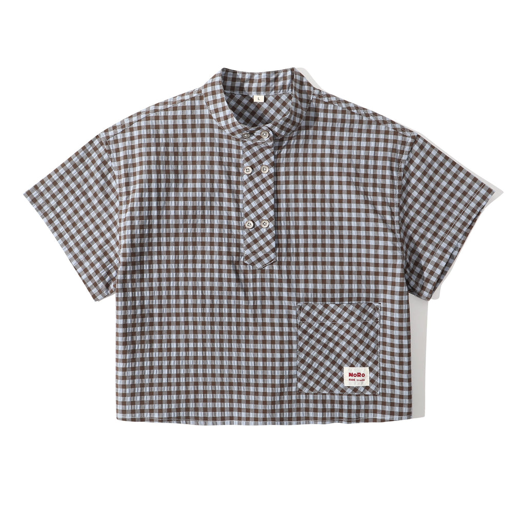 Checkered shirt with a brand label on a white background