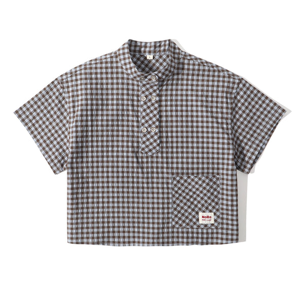 Checkered shirt with a brand label on a white background