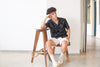 model full shot of a Hong Kong made GOC Studio black lucky bamboo Tencel linen shirt