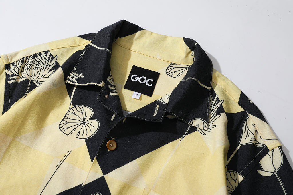 collar view of a Hong Kong made GOC Studio black and yellow lotus Tencel linen shirt