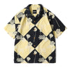 front view of a Hong Kong made GOC Studio black and yellow lotus Tencel linen shirt