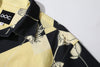 close up of shoulder on a Hong Kong made GOC Studio black and yellow lotus Tencel linen shirt