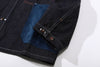 close up of sleeve hem and corozo button closure on a Hong Kong made GOC Studio Japanese cotton denim mix corduroy hip length jacket