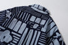 close up of centre back box pleat on GOC Studio indigo dyed discharge city flower cotton shirt