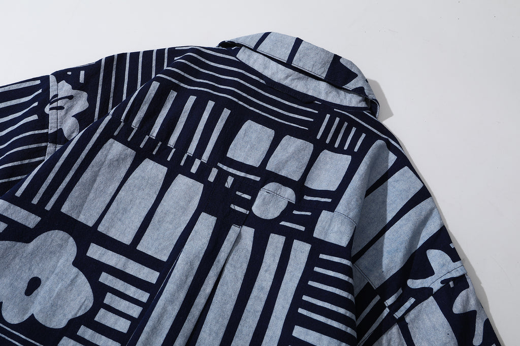 close up of centre back box pleat on GOC Studio indigo dyed discharge city flower cotton shirt
