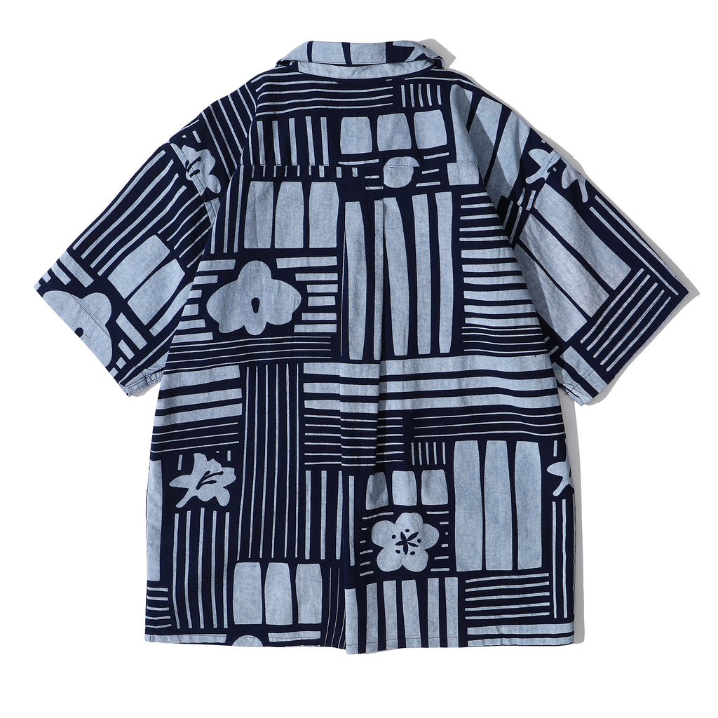 back view of GOC Studio indigo dyed discharge city flower cotton shirt