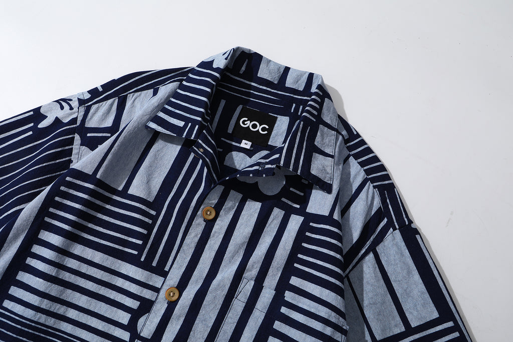 collar view of GOC Studio indigo dyed discharge city flower cotton shirt