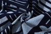 close up of hand indigo dyed discharge city flower cotton fabric texture