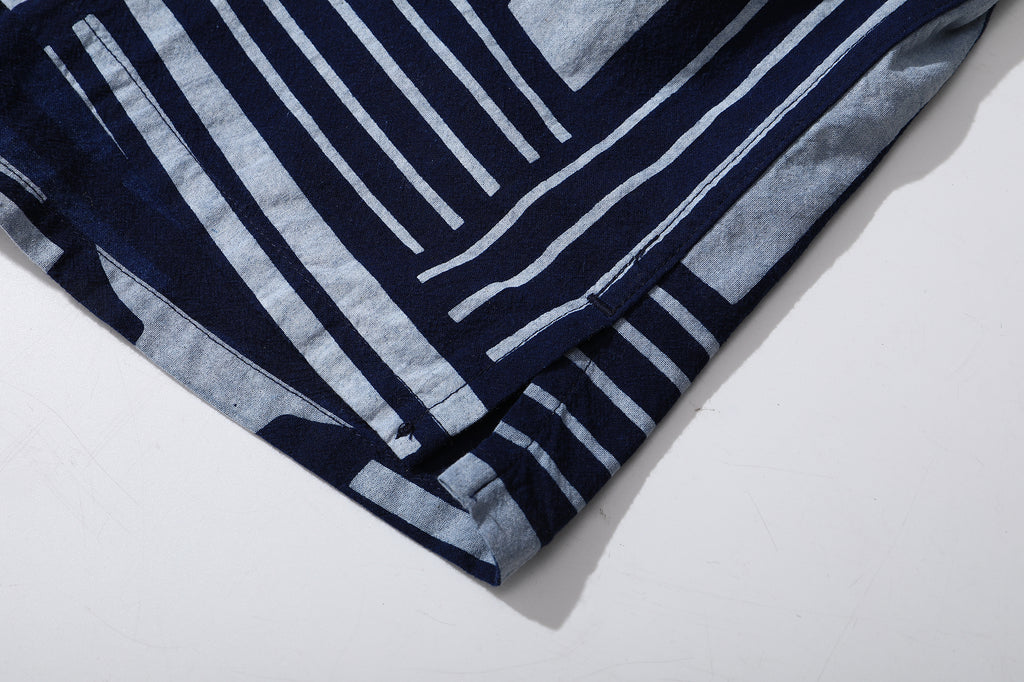 close up of side vent on GOC Studio indigo dyed discharge city flower cotton shirt