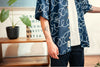model close up shot of GOC Studio hand indigo dyed discharge field flower cotton shirt