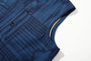 close up of armhole with corduroy accents on goc studio indigo dyed discharge floral print cotton vest 