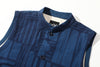 close up of stand collar with corduroy accents on goc studio indigo dyed discharge floral print cotton vest 