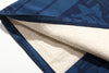 close up of multi coloured nepped contrast lining on goc studio indigo dyed discharge floral print cotton vest 