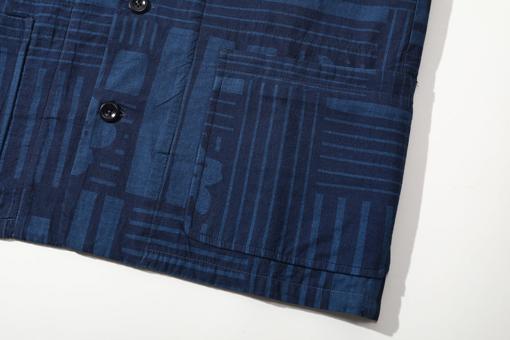 close up of front patch pocket on goc studio indigo dyed discharge floral print cotton vest 