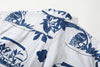close up of center back box pleat on goc studio indigo dyed discharge teapot floral print cotton shirt