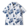 front view of goc studio indigo dyed discharge teapot floral print cotton shirt