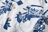 close up of matching pattered chest pocket on goc studio indigo dyed discharge teapot floral print cotton shirt