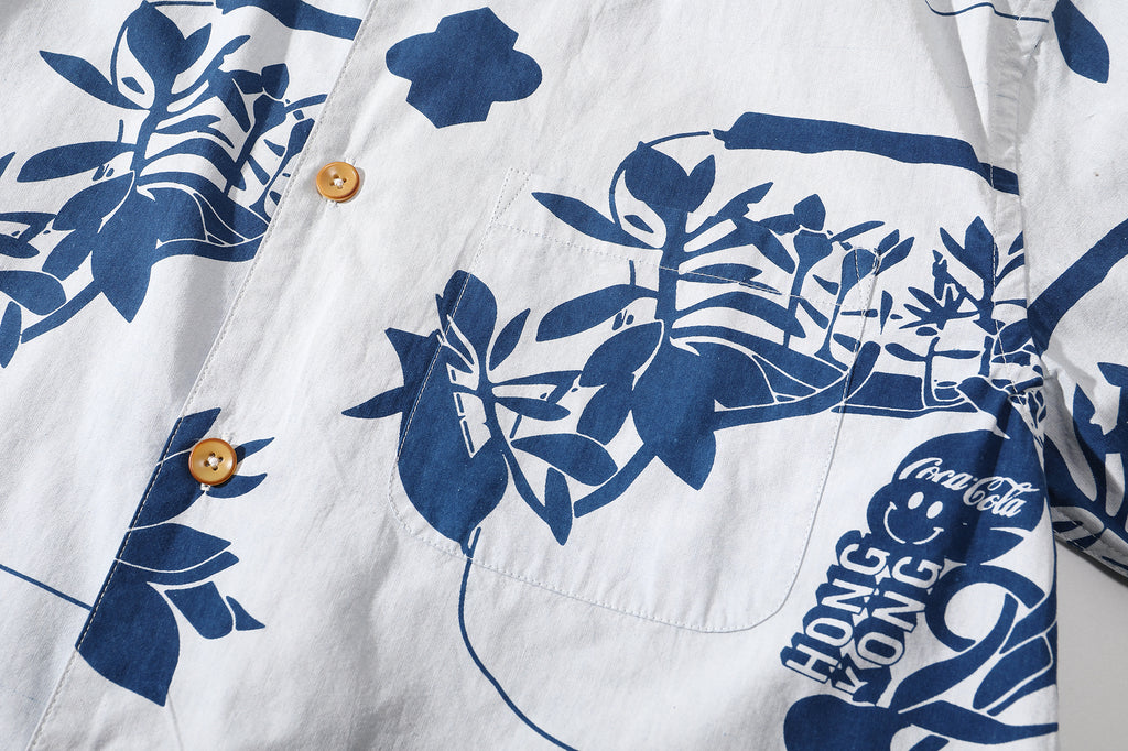 close up of matching pattered chest pocket on goc studio indigo dyed discharge teapot floral print cotton shirt