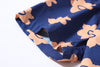 close up of sleeve hem and stitching detail on a Hong Kong made GOC Studio navy and orange daffodil cotton poplin shirt