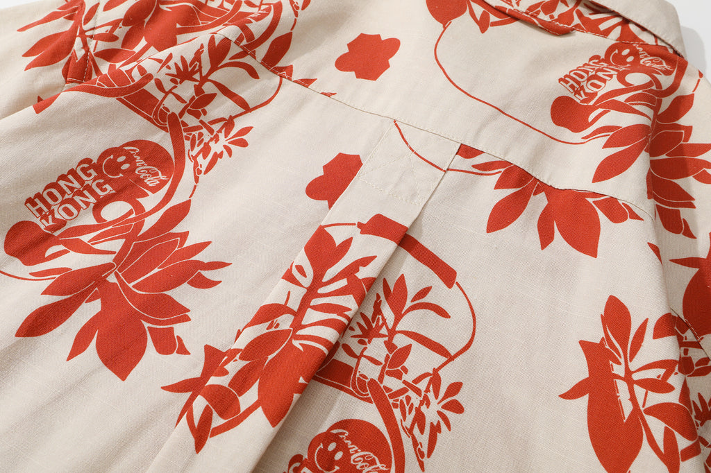 close up of centre back box pleat on a Hong Kong made GOC Studio orange teapot Tencel linen shirt