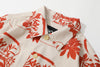 collar view of a Hong Kong made GOC Studio orange teapot Tencel linen shirt
