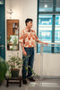 model full shot of a Hong Kong made GOC Studio orange teapot Tencel linen shirt