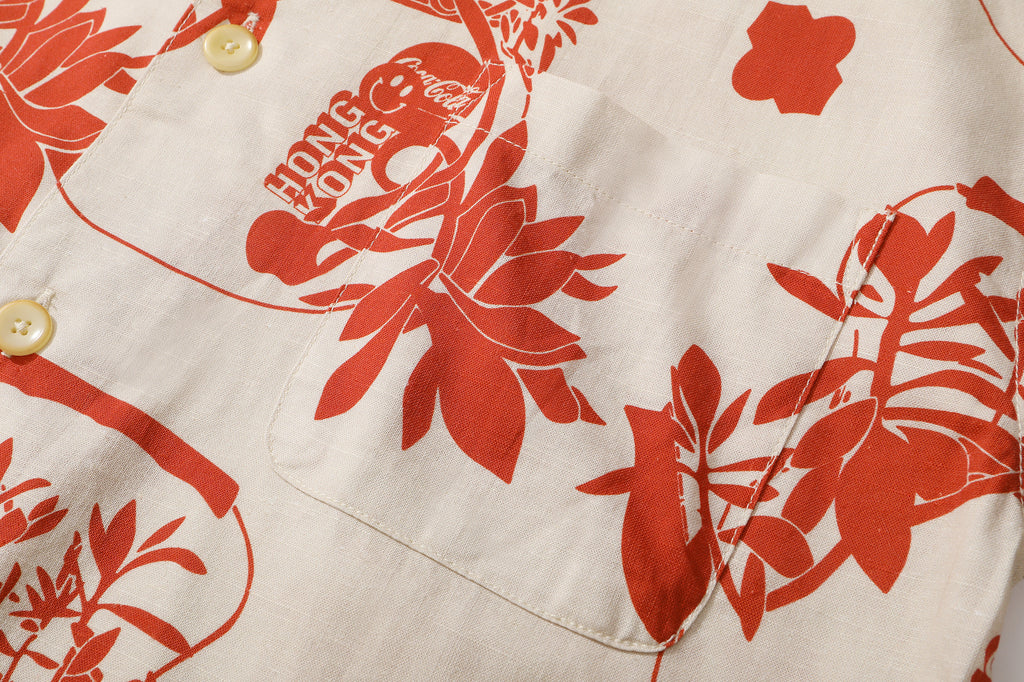 close up of matching pattered chest pocket on a Hong Kong made GOC Studio orange teapot Tencel linen shirt