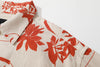 close up of shoulder on a Hong Kong made GOC Studio orange teapot Tencel linen shirt