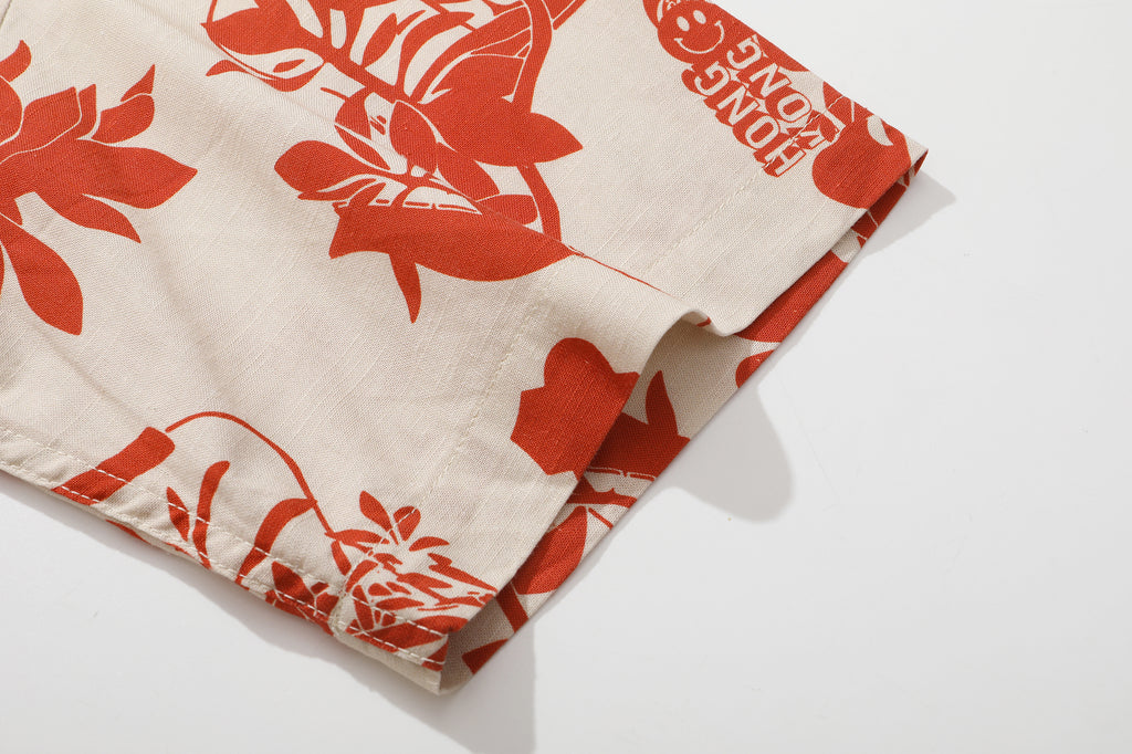 close up of sleeve hem and stitching detail  on a Hong Kong made GOC Studio orange teapot Tencel linen shirt