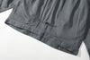 close up of back traditional knot button on a Hong Kong made GOC Studio steel blue Japanese cotton twill oriental jacket