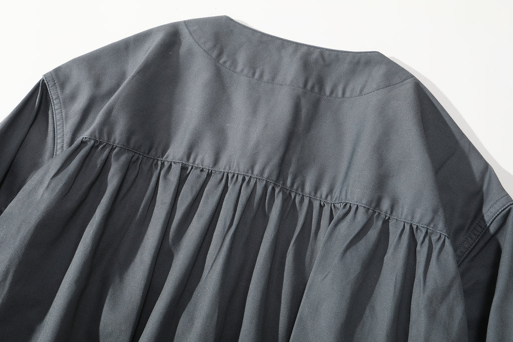 close up of back yoke and gathers detail on a Hong Kong made GOC Studio steel blue Japanese cotton twill oriental jacket