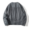 back view of a Hong Kong made GOC Studio steel blue Japanese cotton twill oriental jacket