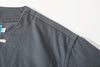 shoulder view of a Hong Kong made GOC Studio steel blue Japanese cotton twill oriental jacket