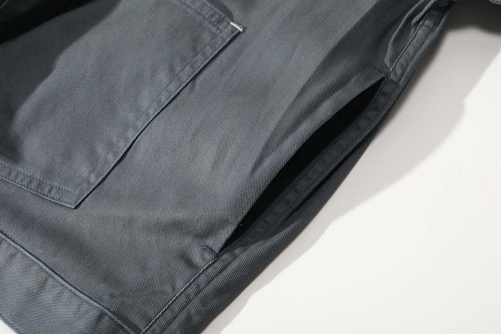 close up of side seam pocket on a Hong Kong made GOC Studio steel blue Japanese cotton twill oriental jacket