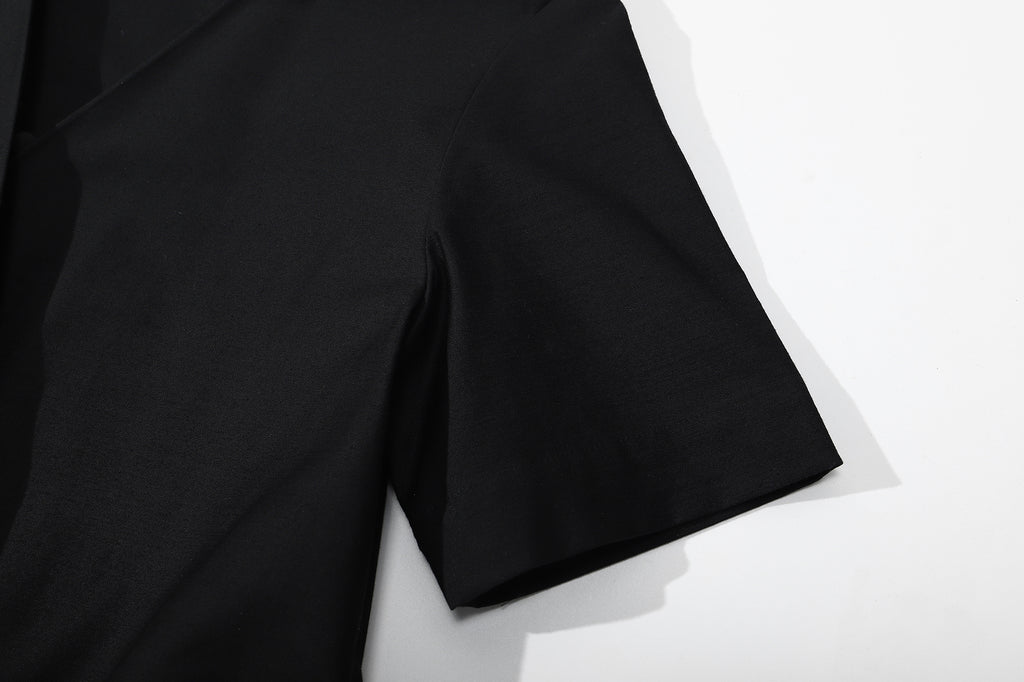 ih black cotton sateen dress close up of the short sleeve cuffs