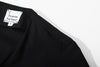 ih black cotton sateen dress close up of the clean shoulder seam construction