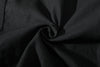 close up of ih black jacket premium japanese cotton herringbone fabric with subtle stripes appearance