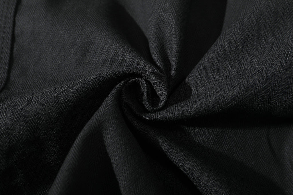 close up of ih black jacket premium japanese cotton herringbone fabric with subtle stripes appearance