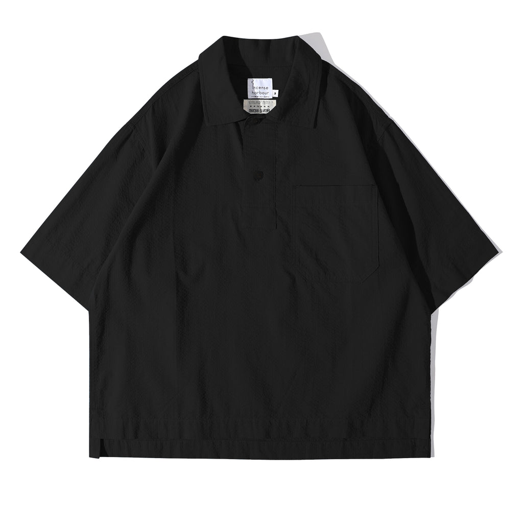 Front view of a Hong Kong made incense harbour black polo collar seersucker shirt front view