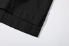 close up of side vents at hem on incense harbour black seersucker shirt