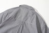 close up of box pleat detail at centre back of black stripe cotton shirt