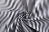 close up of premium japanese 100 cotton black vertical stripe fabric texture