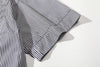 close up of sleeve hem and stitching detail on stripe summer shirt