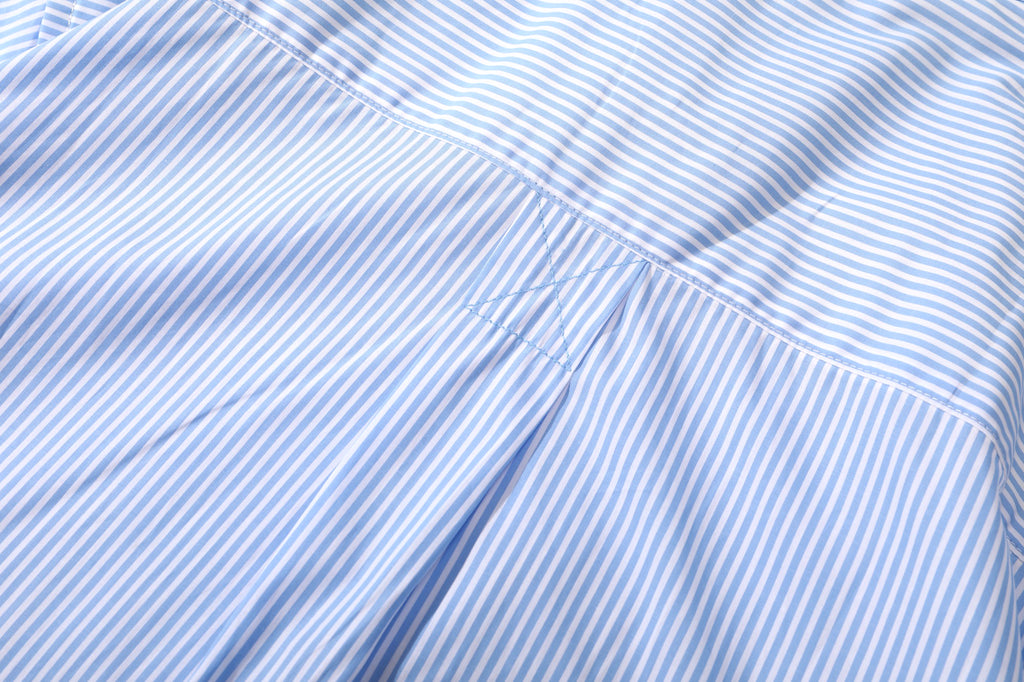close up of box pleat detail at centre back on incense harbour sky blue shirt