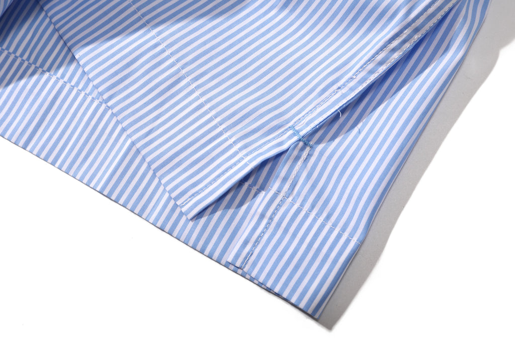 close up of side vents at hem detail on incense harbour sky blue shirt