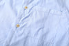 close up of chest pocket with mitered stripe detail on incense harbour sky blue summer shirt